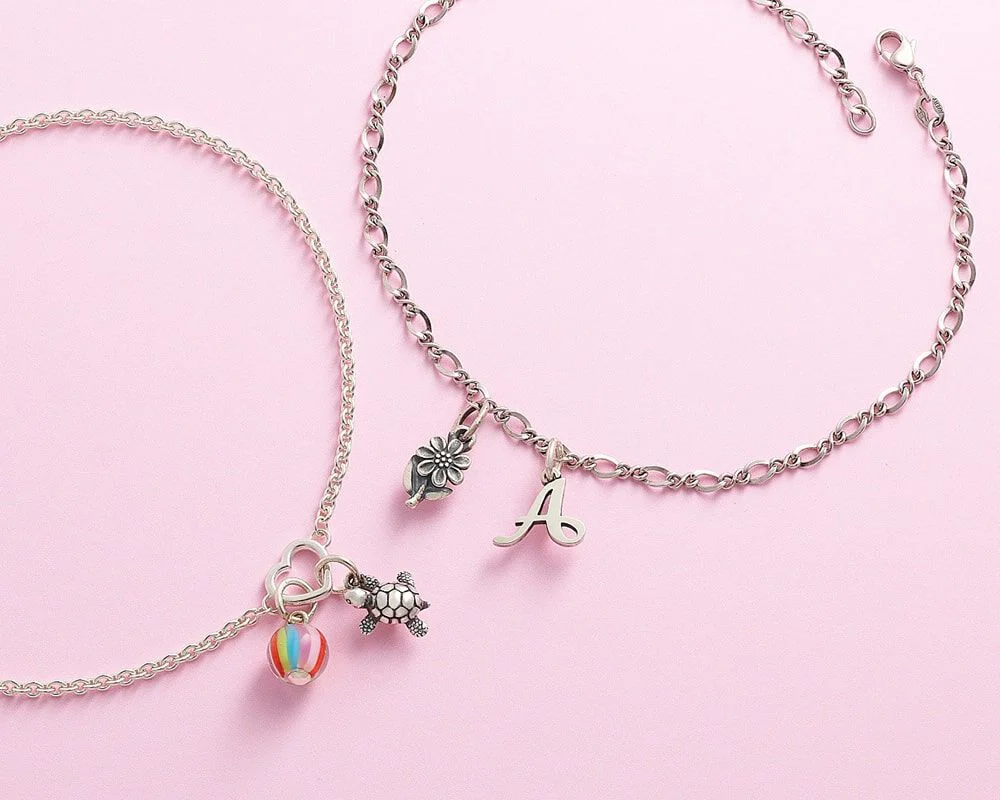 Silver anklets and charms from James Avery.