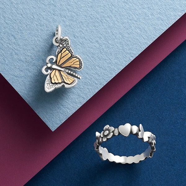 Butterfly-themed charm and ring.