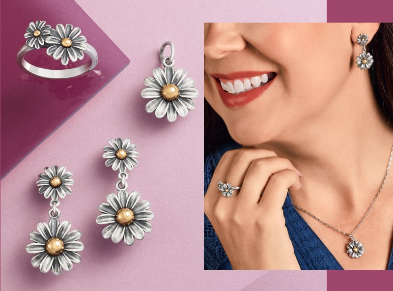 Woman wearing the Blooming Daisies Collection ring, earrings and necklace